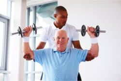 elderly having physical therapy